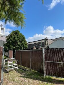 Relining the eavestrough on the west side of rectory