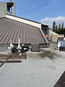 Old HVAC unit removed from the rectory roof